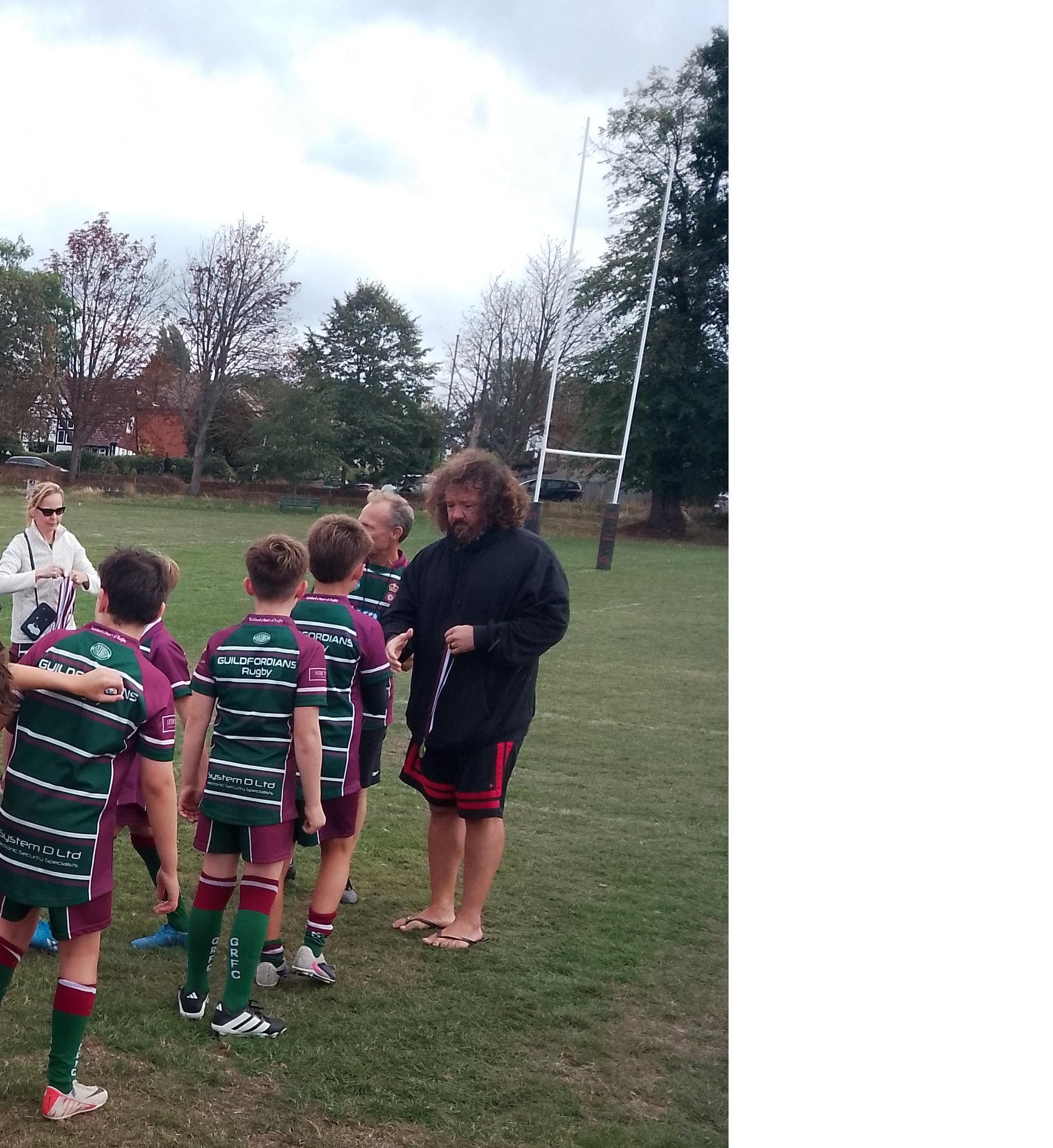 Adam Jones presents the medals